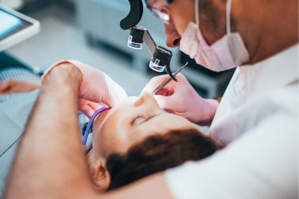 Dentist treating a dental patient